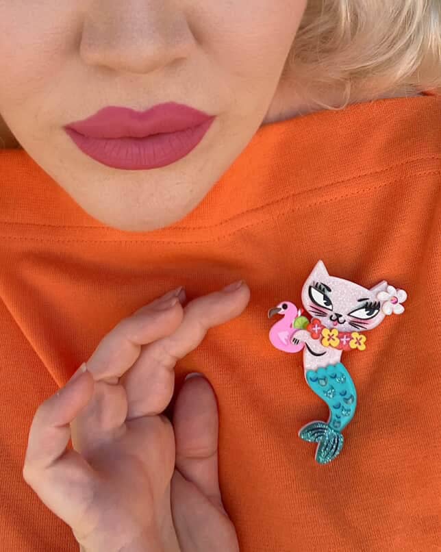 Tiki Merkitty Brooch