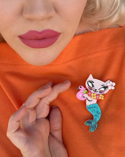Tiki Merkitty Brooch